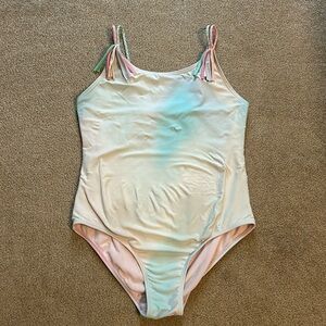 Girls beach lingo light colored one piece swimsuit